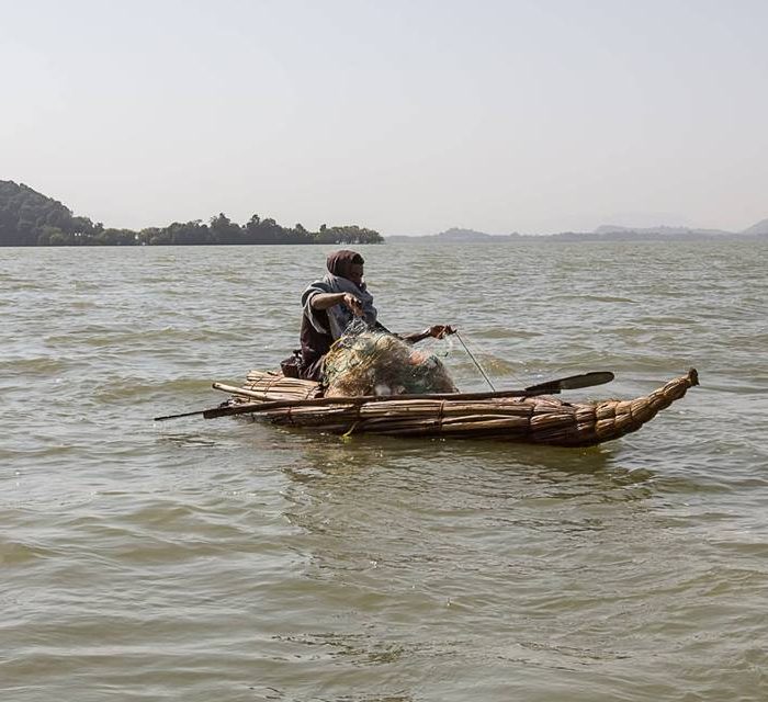 Ethiopia, Fisher Man on Papyrus Boat (Lake Tana), EastAfricaTourOperator.net